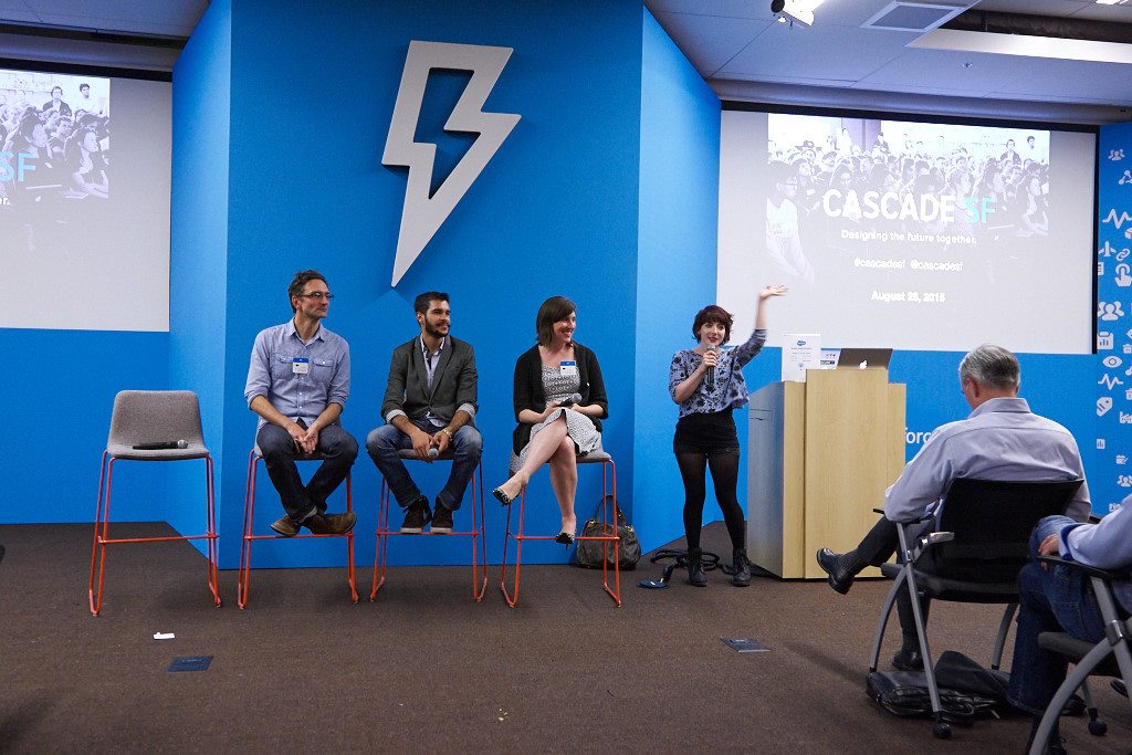 A panel of design leaders on stage in front of the Cascade SF logo